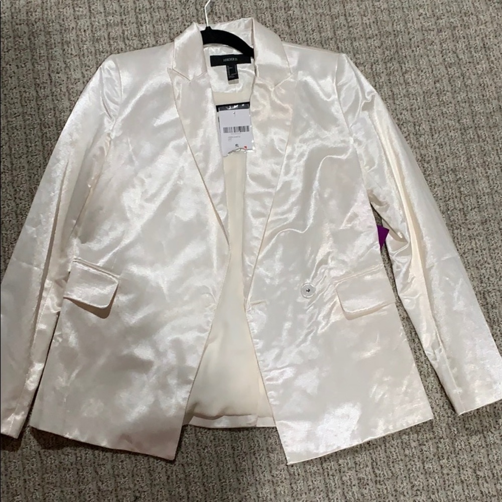 Shiny white blazer